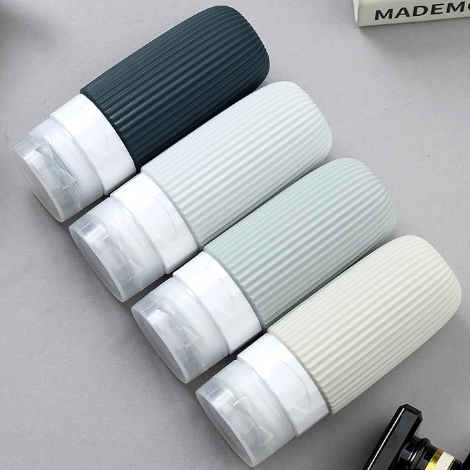 Travel Bottles for Toiletries, Tsa Approved 2oz Travel Bottles, BPA Free Leak Proof Travel Size Toiletry Containers, Refillable Travel Accessories with Toiletry Bag for Shampoo Liquid (4 Pack)