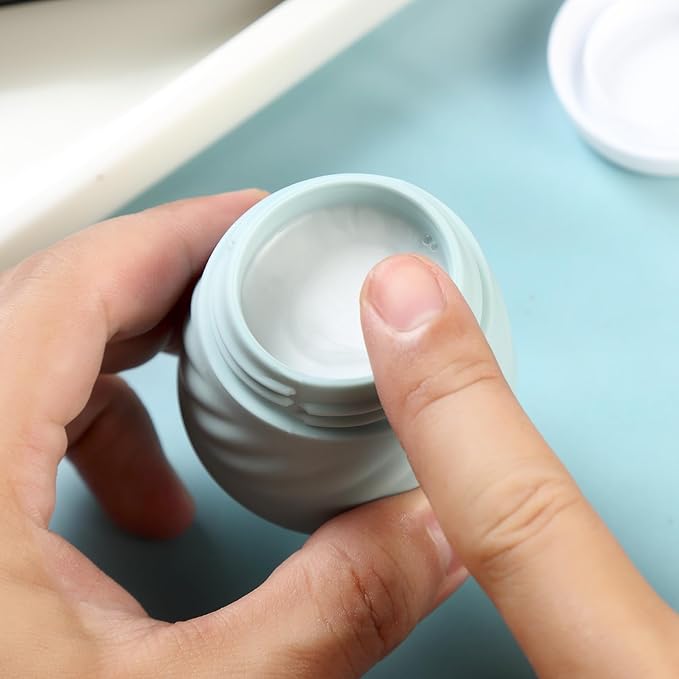 Gemice Silicone Cream Jars TSA Approved Travel Size Containers with Clear Bag, Leak-Proof Travel Accessories with Lid for Cosmetic Face Body Hand Cream (4 Pack)