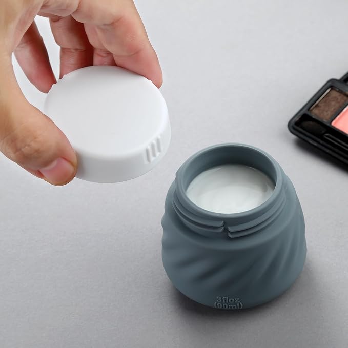 Gemice Silicone Cream Jars TSA Approved Travel Size Containers with Clear Bag, Leak-proof Travel Accessories with Lid for Cosmetic Face Body Hand Cream (4 Pack)