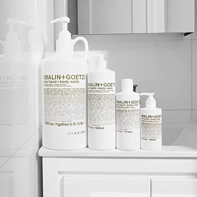 MALIN+GOETZ Hand + Body Wash | Gentle Foaming Cleanser with Botanical Extracts and Amino Acids | Hydrating, pH-Balanced, Unisex Scent | Vegan & Cruelty-Free (Rum, 128 Fl Oz)